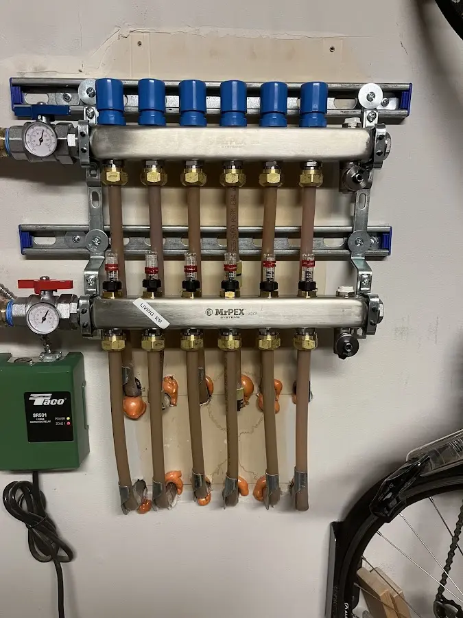 Plumber performing Gas Line Installation at a residential property in Wind Lake